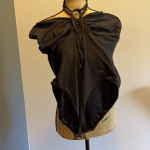 Black Norma Kamali bathing suit.